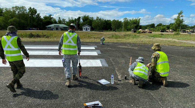 Armed Forces of the Philippines service members assess a runway during an Airfield Survey and Airfield Repair Mobile Training Team program. Story by Squadron Leader Eamon Hamilton. Photos by Joint Australian Training Team - Philippines.