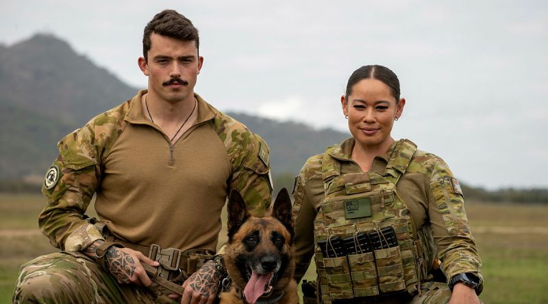 Royal New Zealand Air Force military working dog handler Aircraftman Dylan McClintock, left, and Keno, join Royal Australian Air Force Corporal Renee Cahill, from 27 Squadron Security Flight, at RAAF Base Townsville. Story by Flying Officer Casie Scott. Photos by Captain Chloe Ellwood.