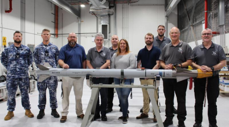 Missile Maintenance Facility Amberley and US government personnel celebrate the completion of a milestone for a training missile maintenance activity at RAAF Base Amberley. Story by Evan Ho.