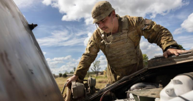 Army vehicle technician Corporal Jacob Sofia inspects the engine of an Australian Light Armoured Vehicle during Exercise Eagle March at the Townsville Field Training Area. Story and photos by Sergeant Matthew Bickerton.