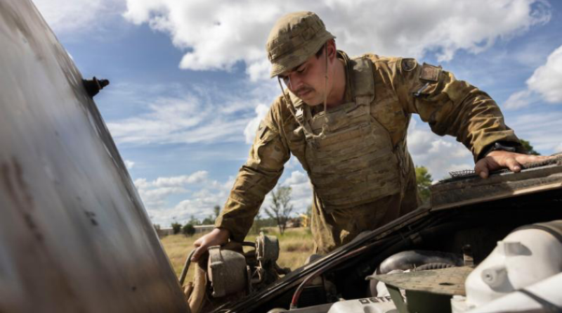 Army vehicle technician Corporal Jacob Sofia inspects the engine of an Australian Light Armoured Vehicle during Exercise Eagle March at the Townsville Field Training Area. Story and photos by Sergeant Matthew Bickerton.