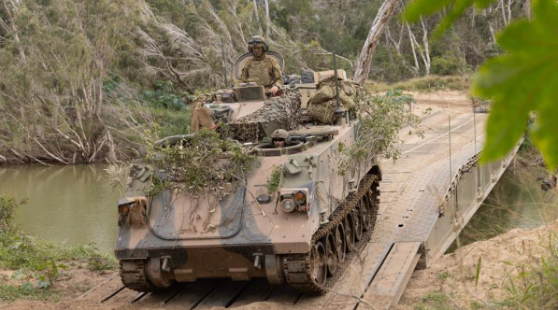 Australian Army heavy vehicles cross a Dry Support Bridge built by soldiers from the 3rd Combat Engineer Regiment during Talisman Sabre 2025 at Townsville Field Training Area. Story and photos by Corporal Luke Bellman.