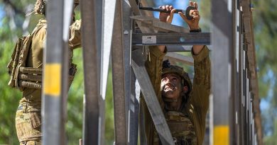 An Australian Army soldier from 6th Engineer Support Regiment, attaches a railing to a fixed modular bridge (FMB) during Exercise Talisman Sabre at Townsville Field Training Area, Queensland. Photo by Sergeant Roger Tang.