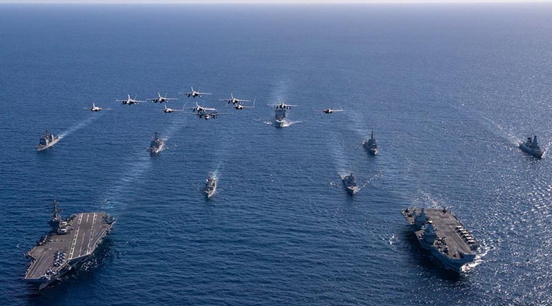 HMAS Sydney transits as part of the double carrier formation, UK Carrier Strike Group, led by HMS Prince of Wales and US Navy’s George Washington Carrier Strike Group, during Exercise Talisman Sabre 2025. Photographer unknown.