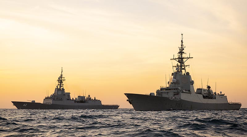 International sister ships meet at sea