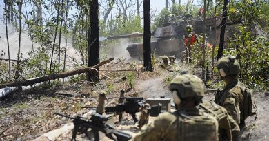 Soldiers from 8th/9th Battalion, Royal Australian Regiment, watch on as an M1A1 Abrams main battle tank fires in support during Exercise Diamond Run 2017. Photo by Captain Anna-Lise Brink.
