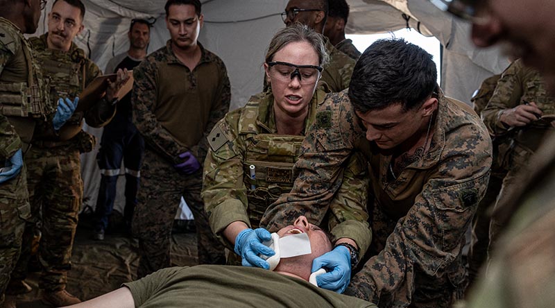Australian Army nursing officer Lieutenant Martina Sydenham from 3rd Health Battalion monitors vital signs of a simulated casualty at Bradshaw Field Training Area in the Northern Territory during Exercise Talisman Sabre 2025. Photo by Corporal Jacob Joseph.