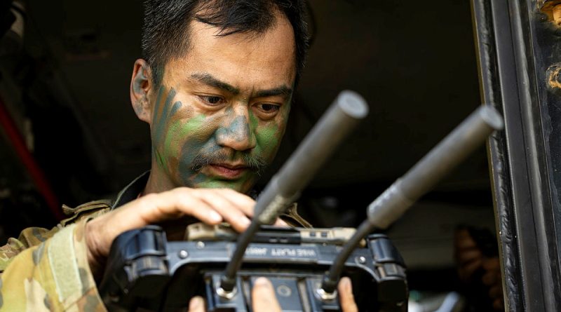 Australian Army soldier Lance Corporal Fred Jabagat, from the 1st Armoured Regiment, controls the M134D minigun remote weapon station attached to a Modular Robotic Vehicle during Exercise Talisman Sabre at Townsville Field Training Area. Story by √. Photos by Lance Corporal Caitlyn Davill.
