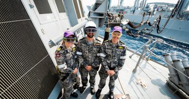 From left, Lieutenant Hannah Roberts, Petty Officer Matthew Samson and Lieutenant Commander James Stahlhut on board HMAS Sydney during a replenishment at sea with Japanese Ship Mashu. Story by Lieutenant Hinako Shiraishi. Photos by Leading Seaman David Cox.