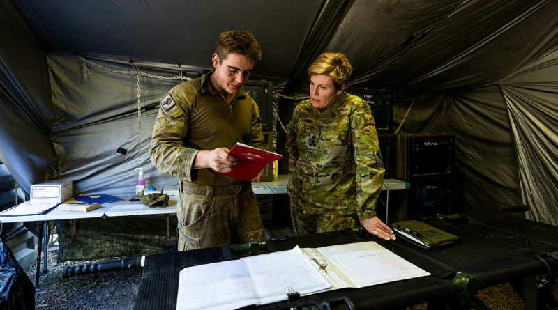 Commander 2nd Health Brigade, Brigadier Louise Martin, visits soldiers at Shoalwater Bay during the South Queensland Warfighter Exercise. Story by Lieutenant Colonel Christopher Rickey. Photo by Corporal Johnny Huang.
