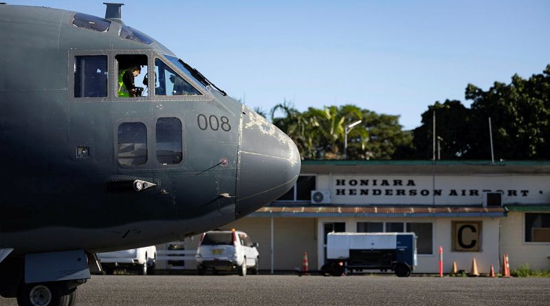 Personnel from 35 Squadron prepare a C-27J Spartan for an aerial surveillance patrol during Operation Solania in the Solomon Islands. Story by Flight Lieutenant Madeleine Magee. Photos by Leading Aircraftwoman Maddison Scott.