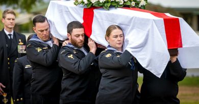 Funeral Guard members, left to right, Leading Seaman Lindsey Young, Able Seaman Jake Clarke and Leading Seaman Bella Cummins, carry the coffin of Leading Stoker Des Jones, as Navy Chaplain David Hastie follows. Story by Lieutenant Commander Ben Robson. Photos by Lance Corporal Joseph Hess.