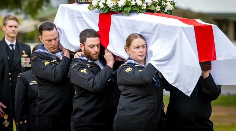 Funeral Guard members, left to right, Leading Seaman Lindsey Young, Able Seaman Jake Clarke and Leading Seaman Bella Cummins, carry the coffin of Leading Stoker Des Jones, as Navy Chaplain David Hastie follows. Story by Lieutenant Commander Ben Robson. Photos by Lance Corporal Joseph Hess.
