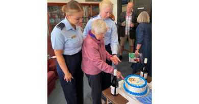 Centenarian and World War 2 Air Force veteran June Hunter cuts her birthday cake with help from Aircraftwoman Molly Blanch and Leading Aircraftwoman Nicole Webb. Photos by Group Captain Gregory Weller.