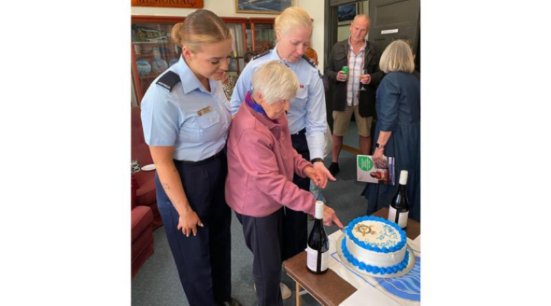 Centenarian and World War 2 Air Force veteran June Hunter cuts her birthday cake with help from Aircraftwoman Molly Blanch and Leading Aircraftwoman Nicole Webb. Photos by Group Captain Gregory Weller.
