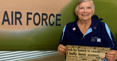 History and Heritage - Air Force volunteer Pamela ‘Margaret’ Wilkinson with a newspaper article from 1965 when she was serving as a nurse at RAAF Base Townsville. Story and photo by Flying Officer Casie Scott.