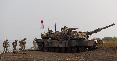 Australian soldiers and an Australian Army M1A1 Abrams conduct an amphibious assault during Exercise Keris Woomera 2024 at Banongan Beach, Indonesia. Photo by Corporal Janet Pan.