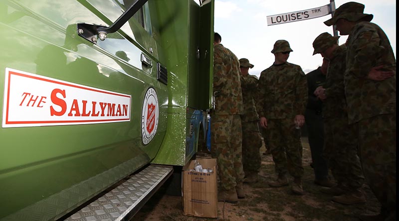 A Sallyman provides hot and cold beverages, biscuits and a friendly ear to soldiers 'out bush'. Photo by Corporal Nick Wiseman.