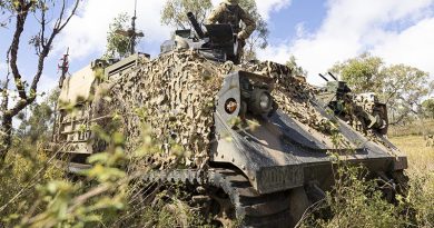 Australian Army soldier Lance Corporal Declan Bowditch from the 1st Armoured Regiment, performs maintenance on an M134D minigun remote weapon station attached to a modular robotic vehicle during Exercise Talisman Sabre at Townsville Field Training Area, Queensland. Photo by Lance Corporal Caitlyn Davill.
