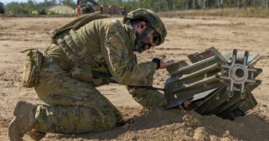 Royal Australian Air Force (RAAF) Corporal Matthew Vella, an explosive ordnance disposal assistant from 65 Air Base Recovery Squadron (65ABRS), assesses a Mark 82 bomb with a snake eye tail fin at airstrip at the Townsville Field Training Area. Story by Flight Lieutenant Sharon Sebastian. Photos by Corporal Brett Sherriff.