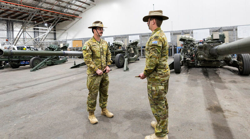 Australian Army soldier Bombardier Sean Dermody, of the School of Artillery, speaks to another Army soldier at Puckapunyal, Victoria. Story by Captain Charles Miranda. Photos by Corporal Johnny Huang.