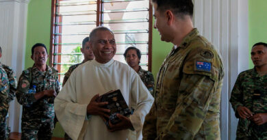Australian Army Chaplain Cesar Lopez gifts a priest with some Holy Bibles at a Local Parish Church at Comoro in Dili, Timor, during Indo-Pacific Endeavour 2025. Story by Lieutenant Marcus Middleton. Photos by Leading Aircraftwoman Nell Bradbury.