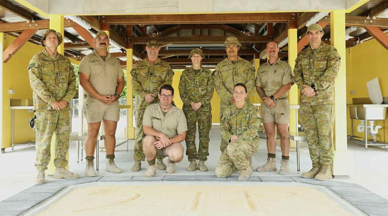 Commander 17th Sustainment Brigade, Brigadier Rebecca Talbot, centre, and Regimental Sergeant Major Andrew Crook visit the newly completed Kup Murri (traditional cooking pit) constructed by 6th Engineer Support Regiment soldiers. Story by Captain Joanne Leca. Photos supplied.