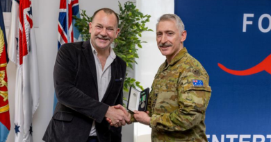 Comedian Anthony ‘Lehmo’ Lehmann is awarded the Australian Operational Service Medal (Civilian) by Deputy Theatre Commander Major General Paul Kenny in recognition 20 years of support to deployed troops. Story and photo by Leading Seaman Nadav Harel.