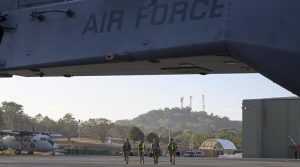 Royal New Zealand Air Force NH90 aircrew approach their helicopter at Port Morsby. RNZDF photo supplied.