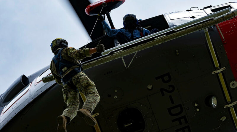 Australian Army soldier Corporal Angus Pugney, of the 4th Health Battalion, conducts patient extraction winch training as part of Exercise Helicon Luk 2025 in PNG. Story by Captain Tadek Markowski. Photos by Corporal Dana Millington.