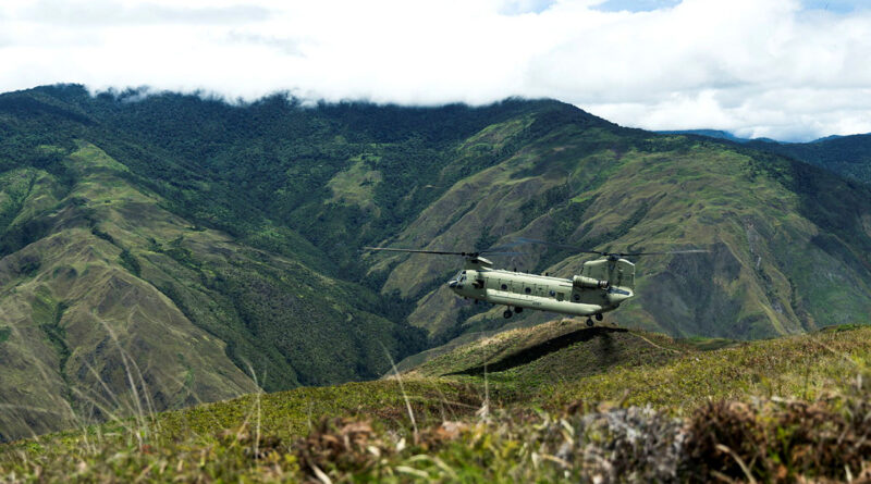 An Australian Army CH-47F Chinook from 5th Aviation Regiment navigates the rugged terrain of Papua New Guinea’s Central Highlands during altitude training. Story by Captain Tadek Markowski. Photos by Corporal Dana Millington.