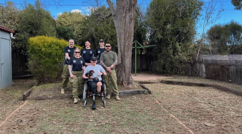 Navy veteran and Invictus Games athlete Luke McCallum with the Military Police team after a rewarding day’s work. Story b y Michelle Hoare.