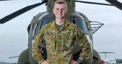 Australian Army Craftsman Marcus Szewczuk, of the 5th Aviation Regiment, stands before an Australian Army CH-47F Chinook in PNG. Story by Captain Tadek Markowski. Photos by Corporal Dana Millington.