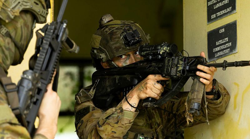 Australian Army soldier Private Annaliese Luckman, of 1st Battalion, the Royal Australian Regiment, conducts an urban clearance as part of Exercise Wantok Warrior in Lae, PNG. Story by Captain Tadek Markowski. Photos by Lance Corporal Jessica Gray.