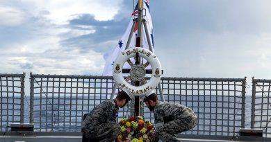 Seaman Angus Norbury and Able Seaman Christopher Diviak lay a wreath on board HMAS Ballarat during a service commemorating the Battle of Leyte Gulf. Story by Sub-Lieutenant Jake Badior. Photos by Leading Seaman Connor Morrison.