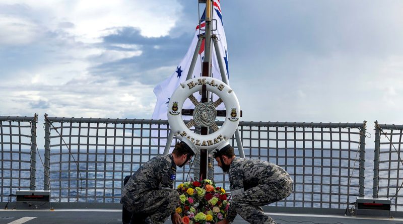 Seaman Angus Norbury and Able Seaman Christopher Diviak lay a wreath on board HMAS Ballarat during a service commemorating the Battle of Leyte Gulf. Story by Sub-Lieutenant Jake Badior. Photos by Leading Seaman Connor Morrison.