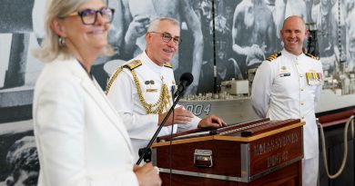 Governor-General Sam Mostyn, Rear Admiral Chris Smith and Commander Ben Weller present the Duke of Gloucester Cup to the crew of HMAS Sydney. Story by Lieutenant Nathan Smith and Lieutenant Hinako Shiraishi. Photo by Paul Berry.