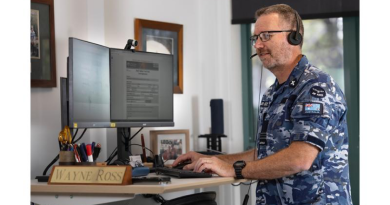 Air Force Chaplain Wing Commander Wayne Ross uses the new RAAF Welfare Trust Fund website at RAAF Base Amberley. Story by Wing Commander Michael Rowe. Photos by Leading Aircraftwoman Taylor Anderson