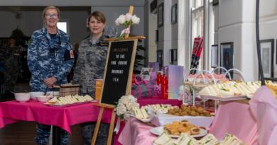 Petty Officer Belinda Rendell and Flight Lieutenant Anne-Marie Keogh host a Pink Ribbon morning tea in support of the National Breast Cancer Foundation and cancer awareness at The Navy's Anchorage Cafe in HMAS Cerberus, Victoria. Photos by Petty Officer Christopher Szumlanski.