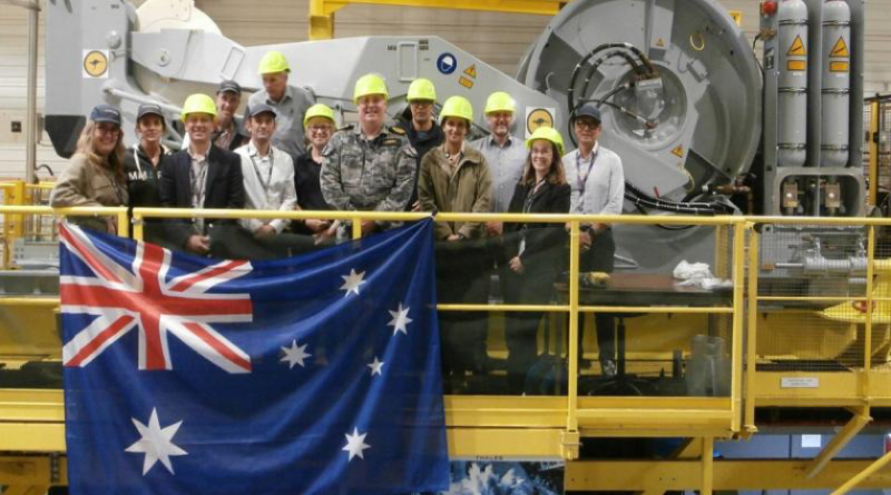 Royal Australian Navy officer Commander Roy Casson, centre, and the team at the Thales Defence Mission Systems facility in Brest, France. Story by Midshipman Thomas Norman.
