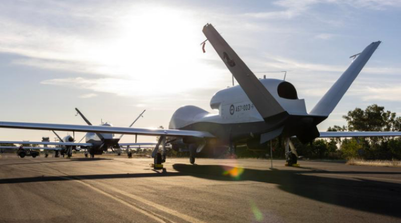 Three Royal Australian Air Force MQ-4C Triton aircraft on the taxiway at RAAF Base Tindal, NT. Story by Flight Lieutenant Grace Casey-Maughan. Photo by Leading Aircraftwoman Mikaela Fernlund.