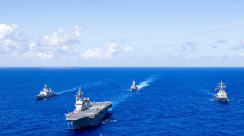 From left, the Indian Navy’s INS Sahyadri, the Japan Maritime Self-Defense Force’s JS Hyuga, the Royal Australian Navy’s HMAS Ballarat and the United States Navy’s USS Fitzgerald sail in company off the coast of Guam during Exercise Malabar. Story by Sub-Lieutenant Jake Badior. Photo by Leading Seaman Connor Morrison.