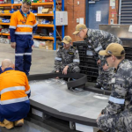 Technicians build trust during submarine upkeep