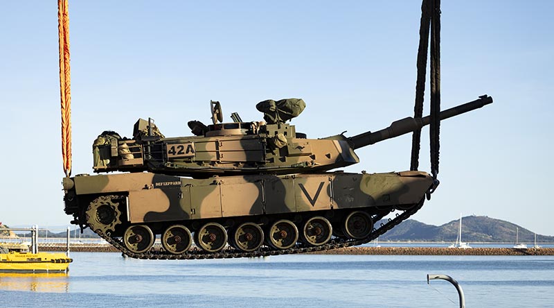 An M1A2 SEPv3 Abrams main battle tank is loaded onto a United States Navy asset during Exercise Talisman Sabre at Townsville Port, Queensland. Photo by Lance Corporal Caitlyn Davill.