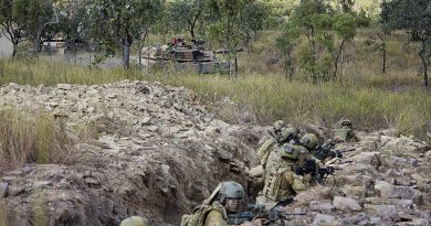Australian Army soldiers from the 1st Battalion, Royal Australian Regiment, conduct a trench clearance, supported by 2nd Cavalry Regiment M1A1 Abrams main battle tanks, as part of Exercise Brolga Sprint at Townsville Field Training Area, Queensland. Photo by Private Jessica Gray.