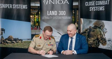 Director General Integrated Soldier System Branch, Brigadier Pat Murray, and NIOA’s General Manager - Weapons and Munitions, Mick Ahern, ink the new small arms support contract. Photo supplied by NIOA.