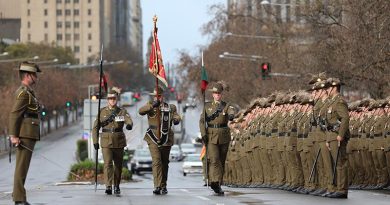 Soldiers of the 1st Armoured Regiment honour their unit's Guidon and first Standard in Adelaide. Photo by Private Sophie Hartley.