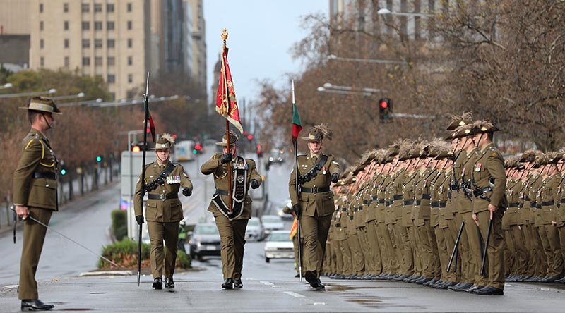 Soldiers of the 1st Armoured Regiment honour their unit's Guidon and first Standard in Adelaide. Photo by Private Sophie Hartley.