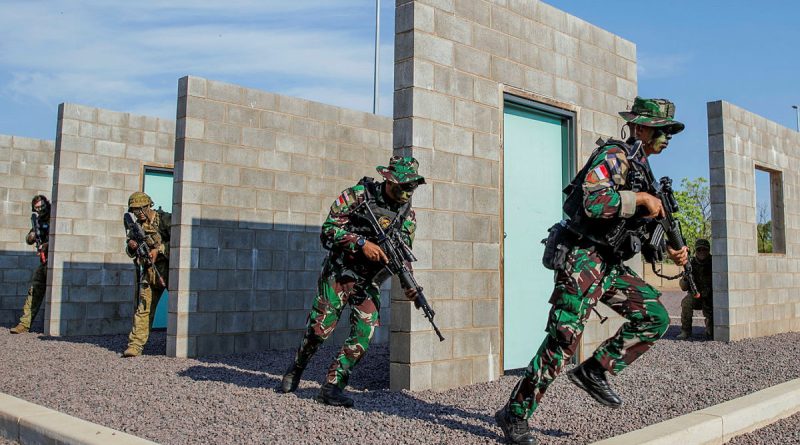 Soldiers from the 5th/7th Battalion, Royal Australian Regiment, conduct an urban assault with soldiers from the Indonesian National Armed Forces, at Robertson Barracks, NT. Story by Captain Nicholas Marquis. Photos by Private Oscar Hanson