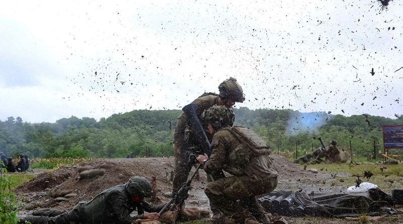Australian and Philippine Army mortarmen fire an 81mm mortar during Exercise Kasangga. Story by Captain Annie Richardson. Photo by Warrant Officer Class 2 Max Bree.